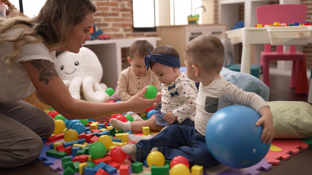 Childcare activities at preschool in Echo Park Los Angeles with children interacting and learning